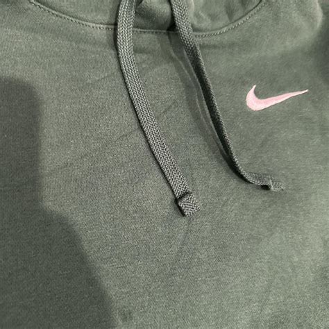 Nike green hoodie Tagged Size L chest 21” length... - Depop