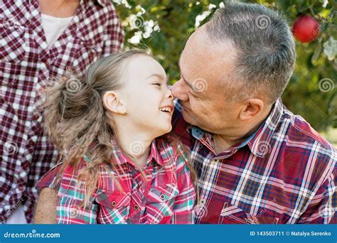 Grandfather with Granddaughter. Multi Generation Family Enjoying in the ...