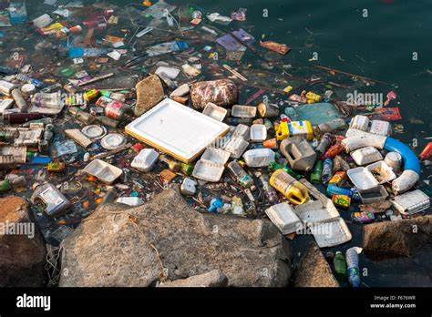 Man made pollution in water Stock Photo - Alamy