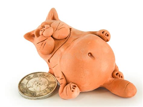 Clay fat cat with coin stock photo. Image of cash, silver - 5691704
