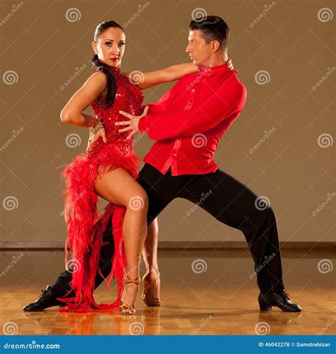 Latino Dance Couple in Action - Dancing Wild Samba Stock Photo - Image