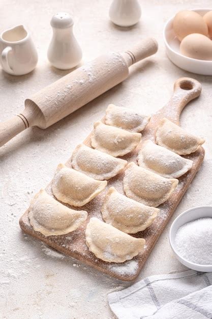 premium photo raw dumpling  potatoes preparation dumplings