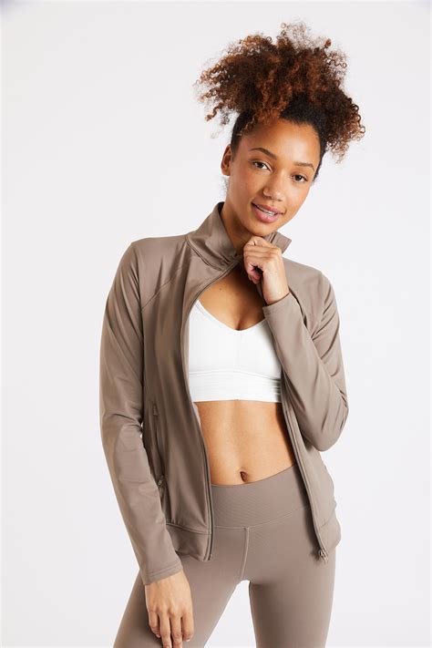 Chaqueta deportiva beige mujer Focus Wellness | Banana Moon®