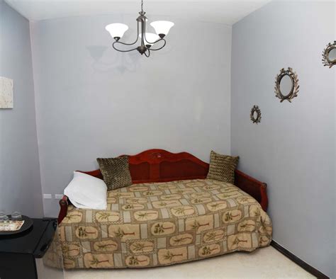 Triple Suite w River and Garden View | Seaside Chateau Belize- Hotel in