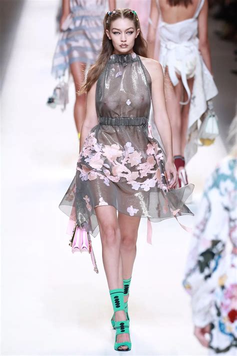 Gigi Hadid flashes nipples in completely sheer dress as she steals