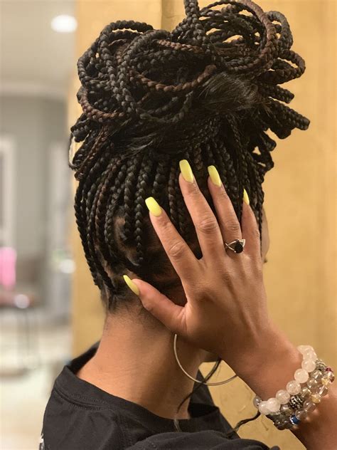 Braids in bun styles are dominating the summer fashion scene 30