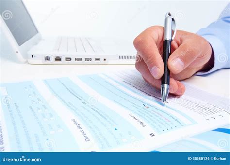 businessman filling  form stock photo image