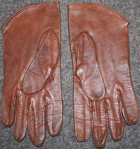 A PAIR OF OFFICERS STYLE GLOVES BRITISH MADE 1945 DATED OFFICERS