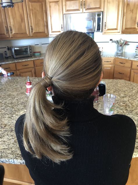 Top stylists explain how to perfectly secure a sideways pony 8