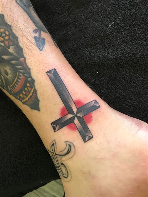 The Upside Down Cross Tattoo Meaning: Interpreting the Symbolism Behind ...