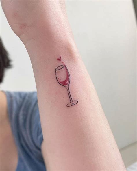 Fine line wine glass tattoo