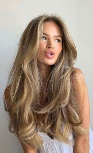 Flowing Elegance 40 Long Layered Haircuts Ideas : Sun-Kissed Long ...