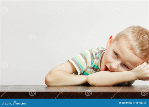 Kid Making Funny Faces Being Bored Stock Photo - Image of fooling ...