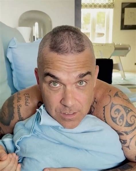 Find out how old is robbie williams during his comeback tour 2
