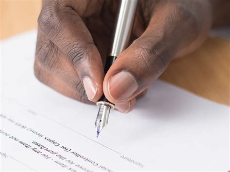 how to sign title of car over to someone