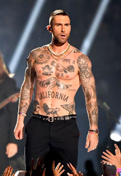 Pin by steph on new-tattoos in 2025 | Celebrity tattoos, Adam levine