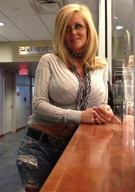 Busty Blonde milf with glasses | Scrolller