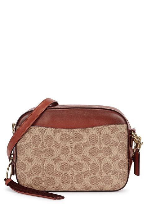 COACH Monogrammed Cross-body Bag in Brown | Lyst