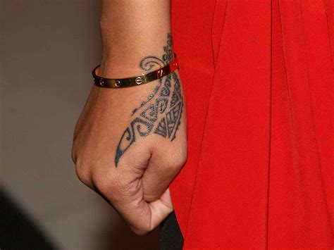 A Guide to Rihanna's Tattoos and What They Mean