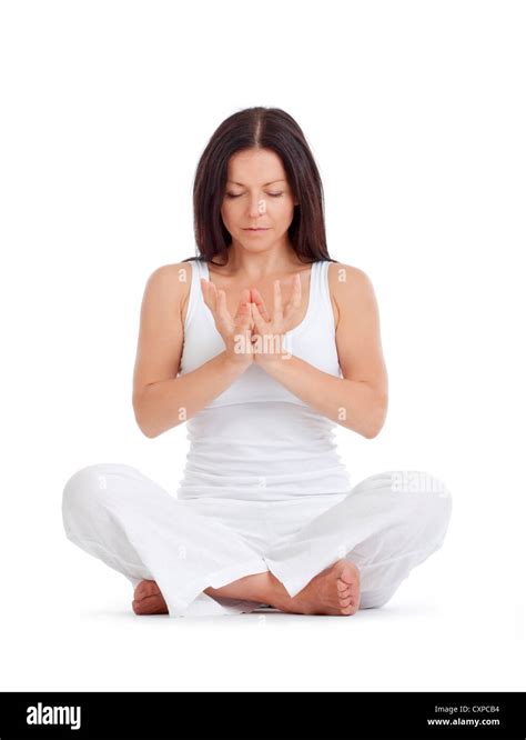 woman sitting on the floor exercising yoga - isolated on white Stock ...