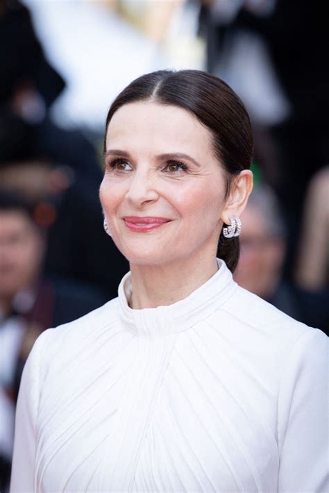 JULIETTE BINOCHE at The Pot-Au-Feu Premiere at 76th Cannes Film