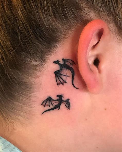 women behind ear tattoo 5