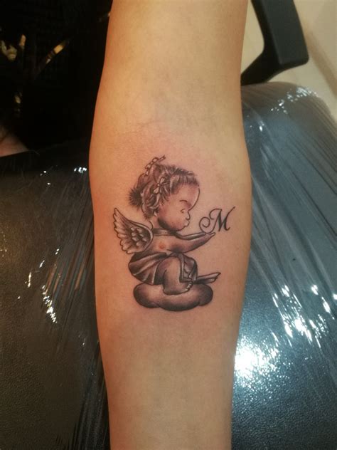 sleeping angel tattoo designs