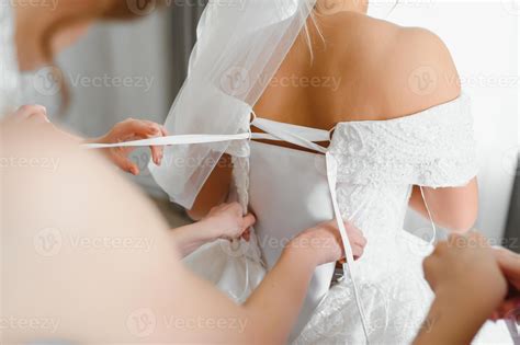 Bride dressing wedding gown. morning bride. 45669597 Stock Photo at