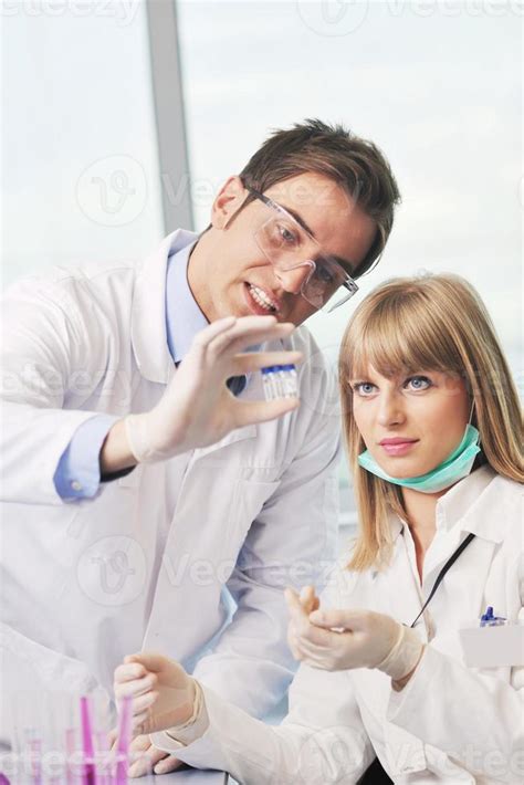 science people in bright lab 10389331 Stock Photo at Vecteezy