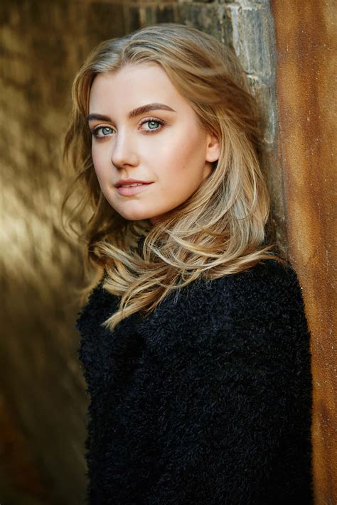Download Isabel Durant In Spotlight Wallpaper | Wallpapers.com