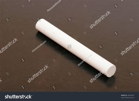 stick chalk  blackboard isolated background stock photo