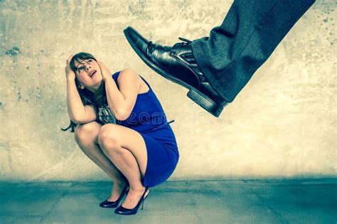 woman stepping  tiny man