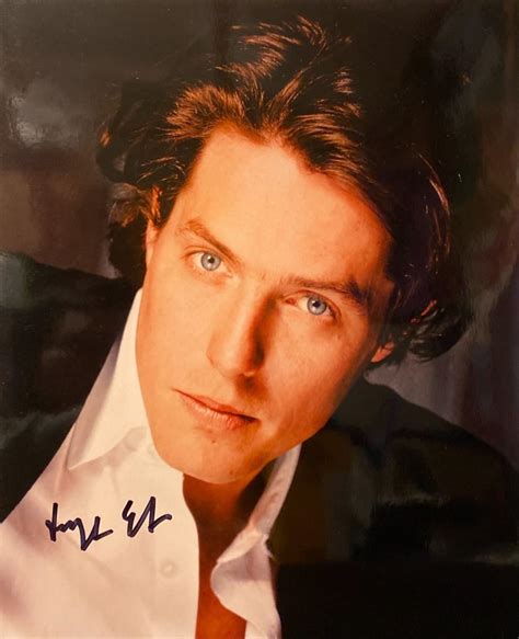 Hugh Grant signed photo | EstateSales.org