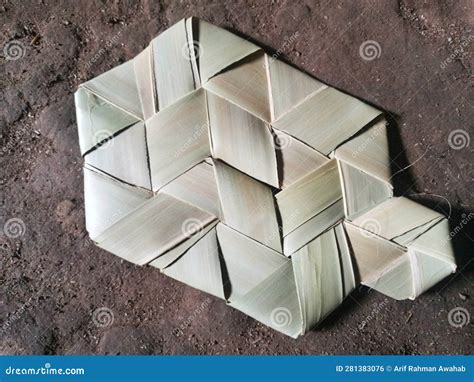 traditional indonesian fan   palm tree leaves   ground stock