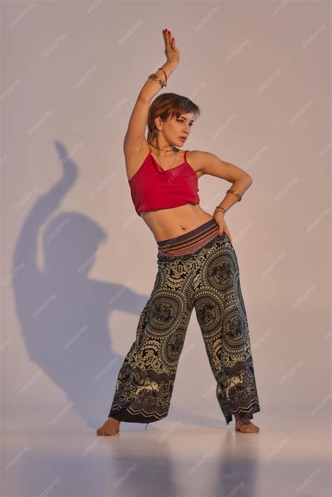 Premium Photo | Young indian woman wearing traditional belly dancer ...