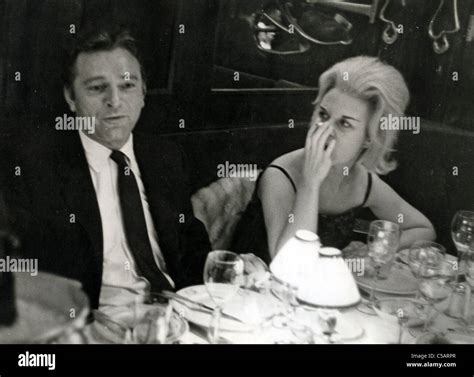 RICHARD BURTON in a Paris restaurant with his then wife Sybil Williams ...