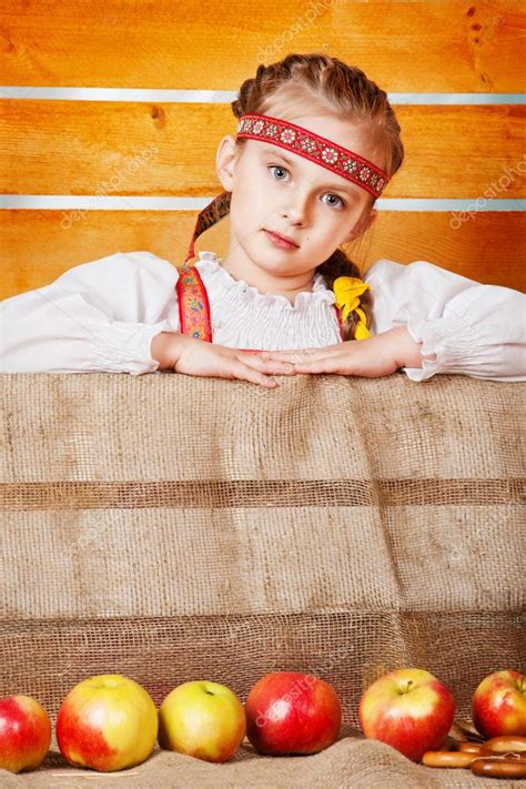 Girl in a national sarafan Stock Photo by ©Chirtsova 25058899