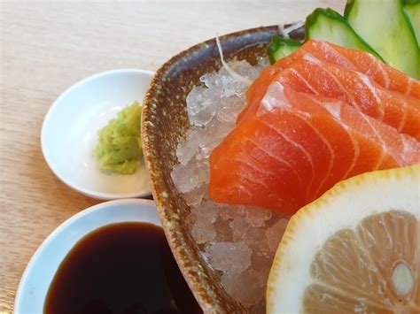 Premium Photo | Japanese food sashimi salmon and sushi