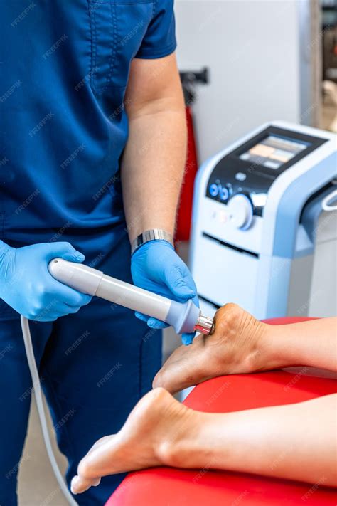 Premium Photo | Patient getting nonsurgical treatment with shock waves