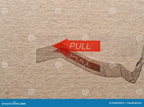 red pull label stock photo image  pulling paper