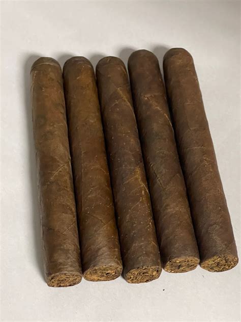 MADE IN MIAMI BY CUBAN ROLLERS CIGARS