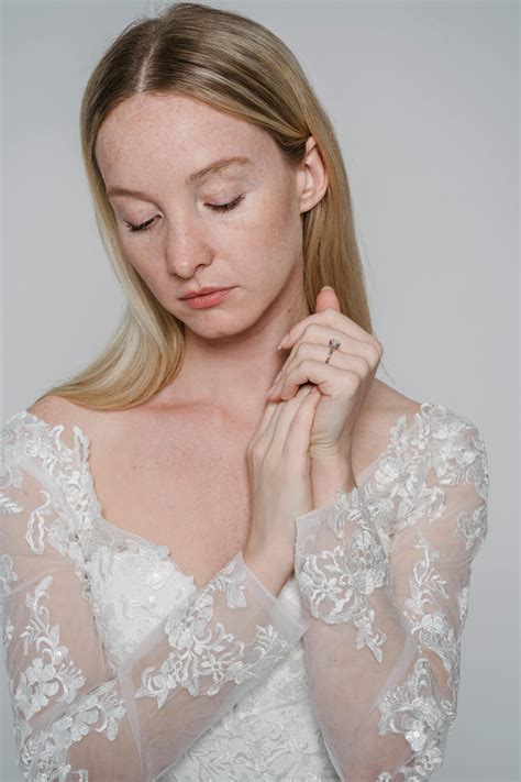 Woman in White Bridal Gown Meditating · Free Stock Photo