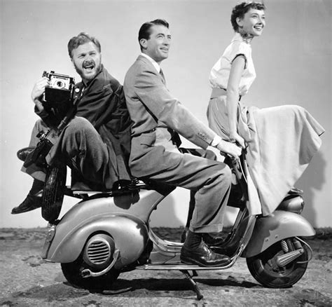 Eddie Albert, Gregory Peck and Audrey Hepburn photographed in a