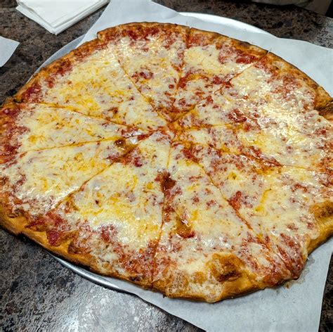 extra cheese pizza dining  cooking
