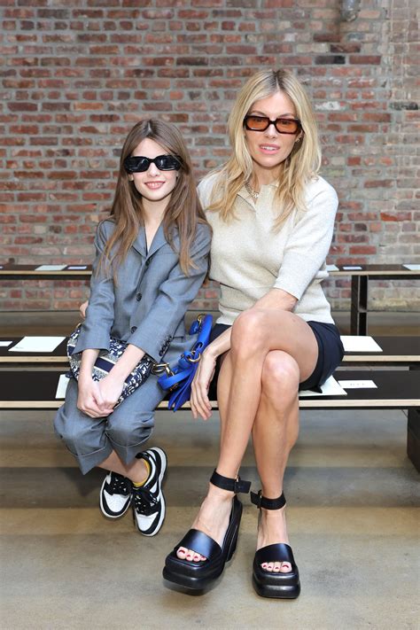 Pregnant Sienna Miller flaunts baby bump, poses with daughter Marlowe