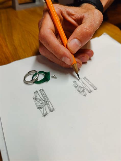 Aegis ring with shield shaped diamond