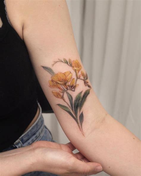 Freesia Tattoo: Unfolding the Meaning and Designs | Art and Design
