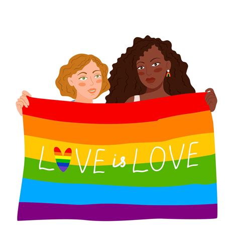 Lesbian girls are holding flag of the day of the gay pride parade