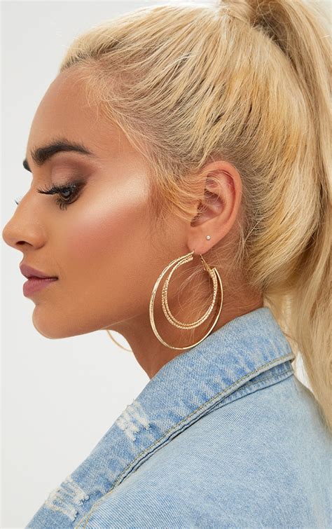 Gold Large Double Hoop Earrings. Accessories | PrettyLittleThing UAE