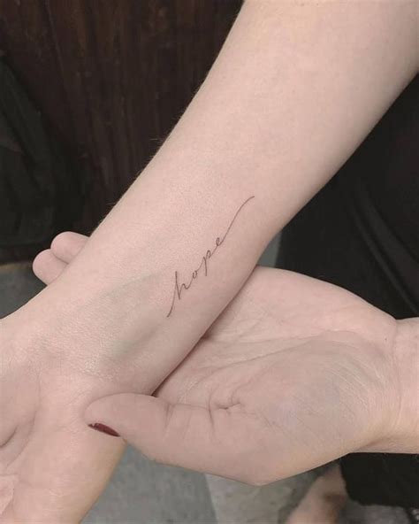 single needle tattoos tattoofilter wrist tattoos words hope tattoo